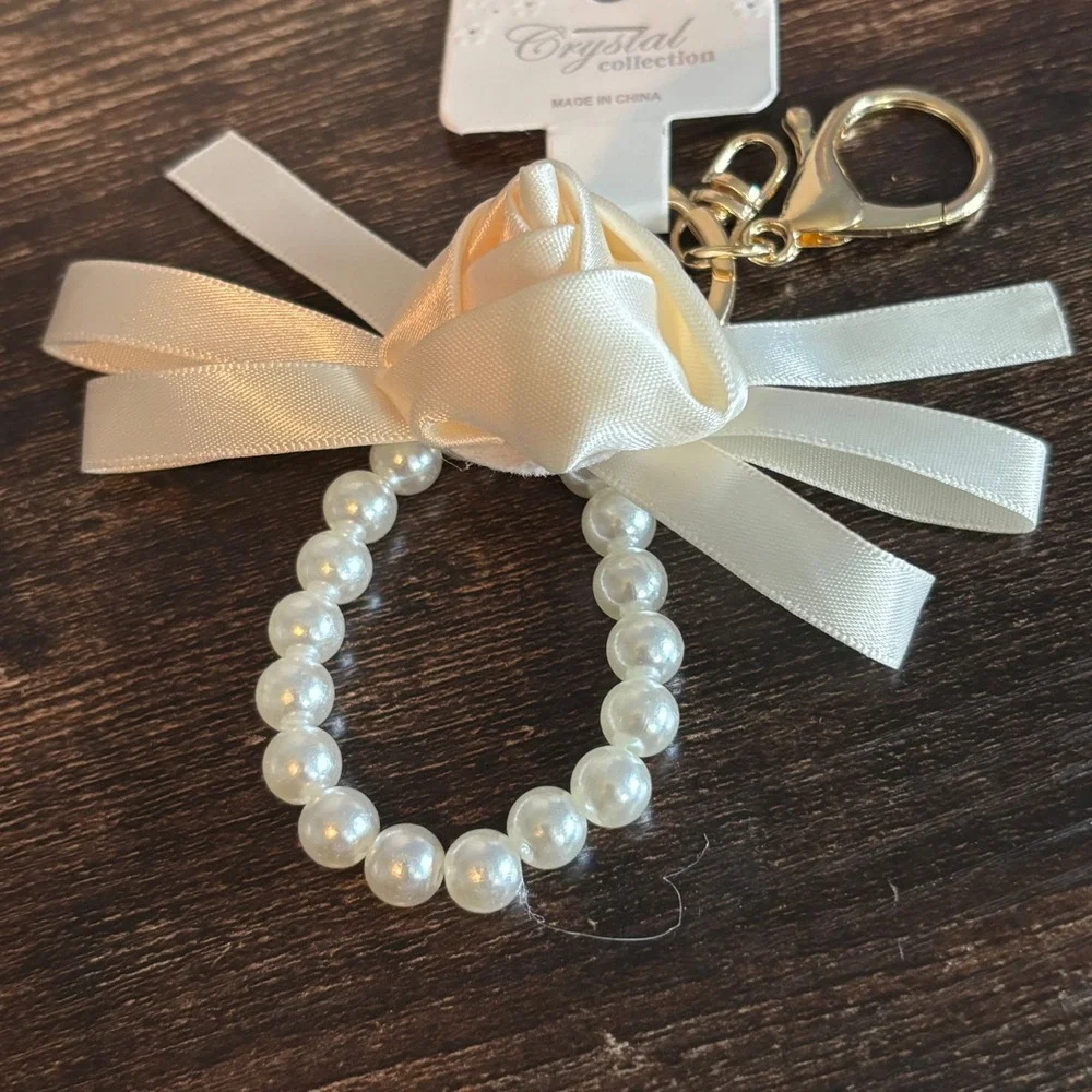 Crystal Collection Ivory Satin Rose Faux Pearl Bow Keychain Gold Tone Clasp